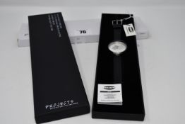 A boxed as new Architecture Projects watch.