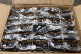 A quantity of as new Doro charging cradles for DFC-0030/0040/0050 (Approximately 150 items).