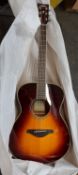 One boxed as new Yamaha FS-TA TransAcoustic guitar in a sunburst finish.