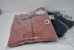 Three items of as new Indi & Cold clothing; a Mono jumpsuit (XL), Chaqueta top (XL) and Jersey