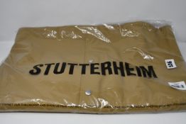 A women's as new Stutterheim Mosebacke raincoat (XL - RRP £180).