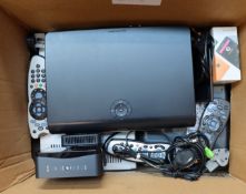 A Lumia 435 mobile phone, one other and three Sky boxes: two Sky+HD and one Sky+ including remote