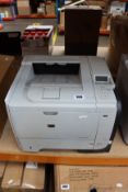 A pre-owned Hewlett Packard LaserJet P3015 Printer.