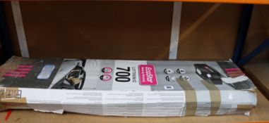 A boxed as new EcoStar Liftronic 700 garage door motor (Damage to box).