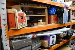 Two shelves of miscellaneous items to include decorative plates, toys and household items.