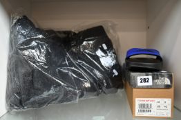 An as new The North Face New Loyalton zip up fleece (L) and Base Camp Slide II (UK 9).