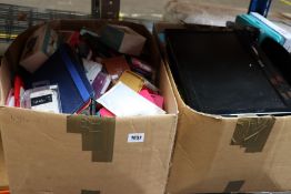 Two boxes of assorted as new mobile phone and laptop cases, small electrical items and a pre-owned