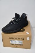 A pair of as new Adidas Yeezy Boost 350 V2 trainers (UK 9.5).