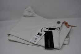 Two pairs of Marc Cain collection trousers (Size N1 and N2?).