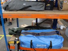 An as new Eurohike Moon Chair DXL, a pre-owned Trakker canopy, a pre-owned trail tub chair, a pre-