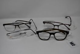A pair of as new Exalto glasses frames with clear glass (RRP £270), two pairs of as new P+US Combo