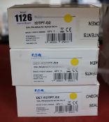 Nine boxed as new Eaton dual PIR/uWave pet motion radios (DET-RDTPT-G2 space protection).