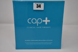 Two boxed as new Capillus cap+ clinical hair therapy bundles (Includes shampoo, conditioner,