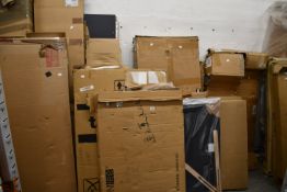 A large quantity of miscellaneous flatpack furniture and related items.