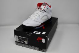 A pair of as new Nike Air Jordan 5 Retro sneakers (UK 3.5).