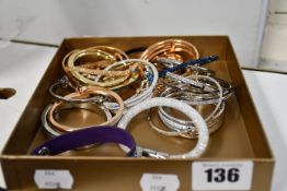 A quantity of assorted as new Swarovski bangles (Unboxed, No Tags).