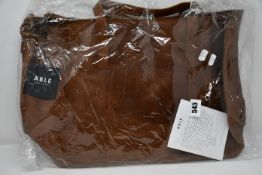 A man's as new Able Local + Global leather travel bag with shoulder strap.