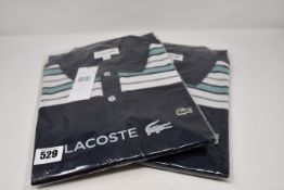 Five as new Lacoste polo shirts (US sizes S, 2 x M, L, XL).