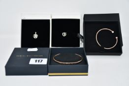 A quantity of four as new Jewellery to include one Daniel Wellington rose gold small cuff bracelet
