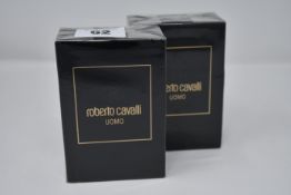 Five boxed as new Roberto Cavalli Uomo eau de toilette (100ml).