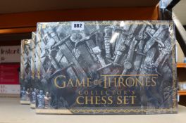 Three boxed as new Game Of Thrones Collector's Chess Sets (Detailed resin pieces).