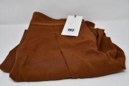 A pair of as new Uterque trousers (M).