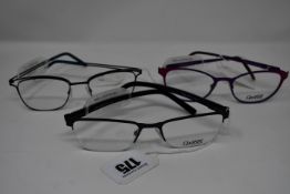 Three pairs of as new Oxibis glasses frames with clear glass (RRP £230 each).
