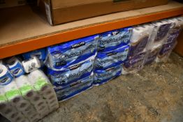 A large quantity of toilet rolls.