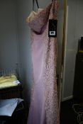 An as new X & M Collection 8035 prom/wedding gown (Size 40).