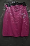 An as new Natasha Zinko slim fit pink mini skirt (Size 34 - RRP £513).
