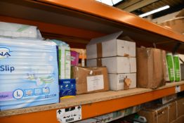 A quantity of menstrual/incontinence pads/panty liners and related items to include three Tena