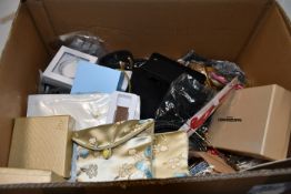 A box of assorted costume Jewellery to include necklaces, rings, bracelets and related items.