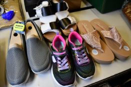 Four pairs of as new Skechers footwear; Yoga Foam sandals (UK 6), Luxe Foam wedges (UK 3) and two