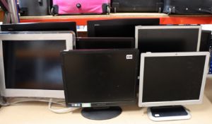 Eight computer monitors; 2 x Dell Ultrasharp 2000FP , 1 x Formac Gallery, 1 x Hanns G HSG1097, 1 x