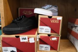 Three pairs of Vans footwear; two pairs of Ward (UK 2.5) and Filmore Deacon (UK 8) together with a