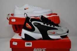 Two pairs of as new Nike trainers; Zoom 2K (UK 8.5) and Court Vintage Premium (UK 9).