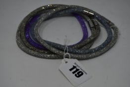 Three as new Swarovski silver Stardust (M,) necklaces and one lilac and one silver Swarovski wrap