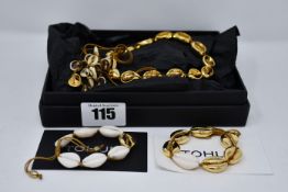 One as new Tohum by Verda Alaton large faux Puka shell necklace.