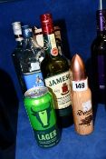 Six bottles of alcohol to include Jameson's, Bombay dry gin, Treserres and a can of larger (Over 18s