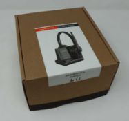 A boxed as new Plantronics Savi W8220 Wireless DECT Stereo Headset with Dock (Box opened).