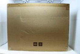 A boxed as new Mi Robot SDJQR02RR Vacuum Cleaner in White. Bagless, HEPA filter, 0.42litres.