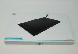 A boxed as new Huion H610 Pro Graphics Drawing Pen Tablet with 8 Keys. 8192 Pressure Levels.
