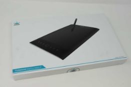 A boxed as new Huion H610 Pro Graphics Drawing Pen Tablet with 8 Keys. 8192 Pressure Levels.