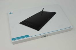 A boxed as new Huion H610 Pro Graphics Drawing Pen Tablet with 8 Keys. 8192 Pressure Levels.