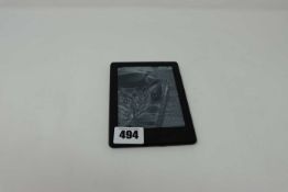 A pre-owned Amazon Kindle (SY69JL) E-Reader in Black.