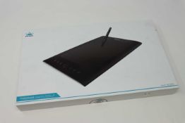 A boxed as new Huion Graphics Drawing Pen Tablet H610 Pro. 8192 Levels of Pressure Sensitivity. 10 x