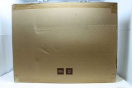 A boxed as new Mi Robot SDJQR02RR Vacuum Cleaner in White. Bagless, HEPA filter, 0.42litres.