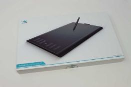 A boxed as new Huion New 1060 Plus Graphics Drawing Tablet. 10 x 6.25inch Digital Drawing tablet