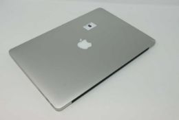 A pre-owned MacBook Pro A1398 sold for parts (Serial: C02PQ1Y3G8WN) (Does not power on, liquid
