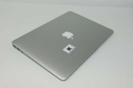 A pre-owned MacBook Air A1466 sold for parts (Serial: FVFX5WVMJ1WK) (Does not power on. Liquid